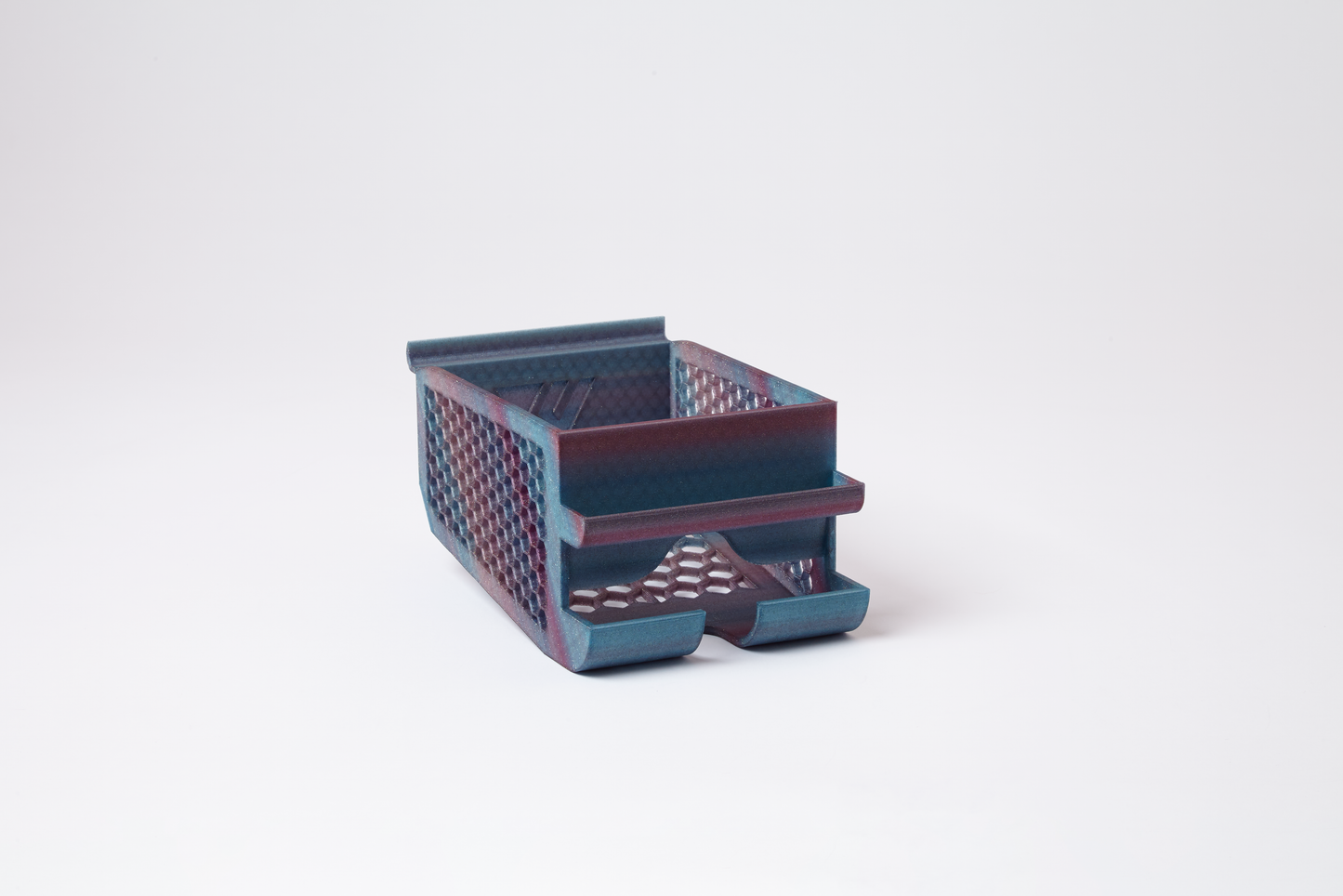 Multicolor blue and purple Slatwall-compatible pre-roll bin with gold flecks, angled side view