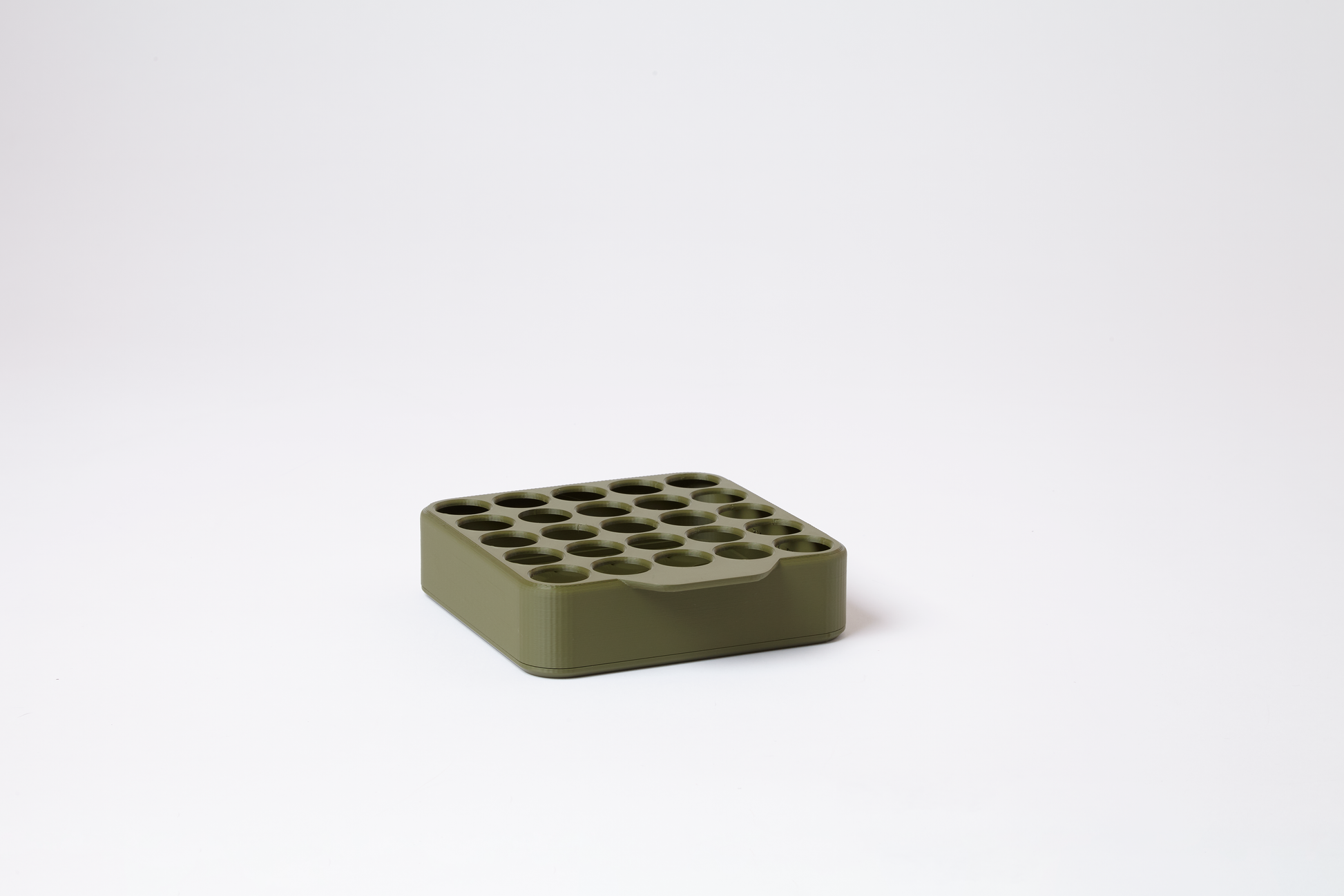 Empty vintage military green grid display for 22mm pre-roll tubes, holds 25 tubes in 5 rows